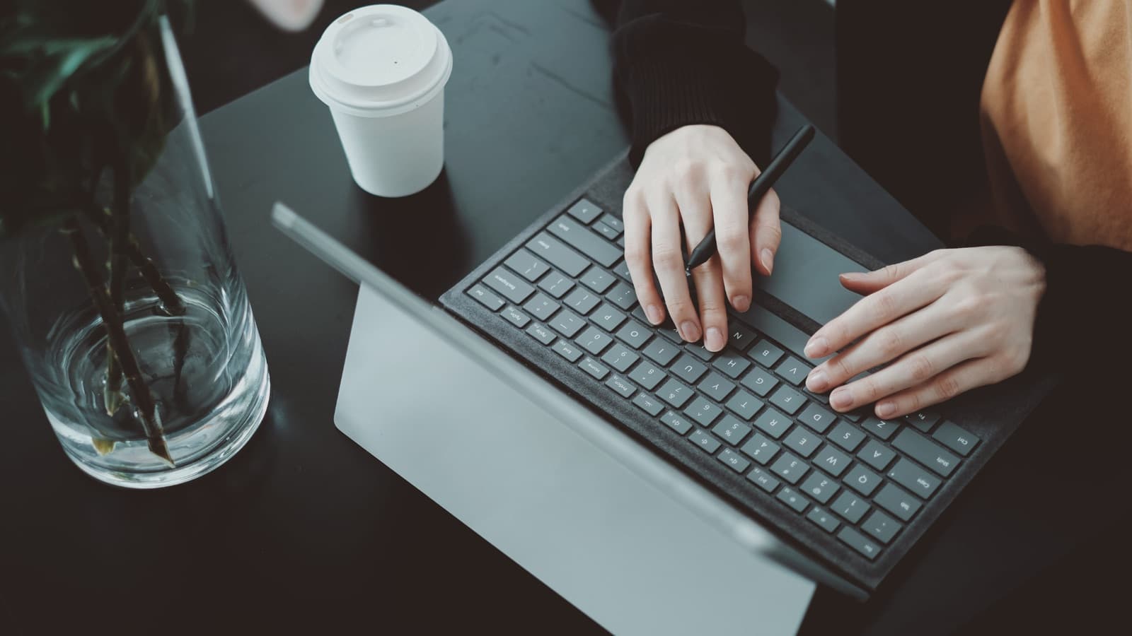 Working at a desk with a laptop